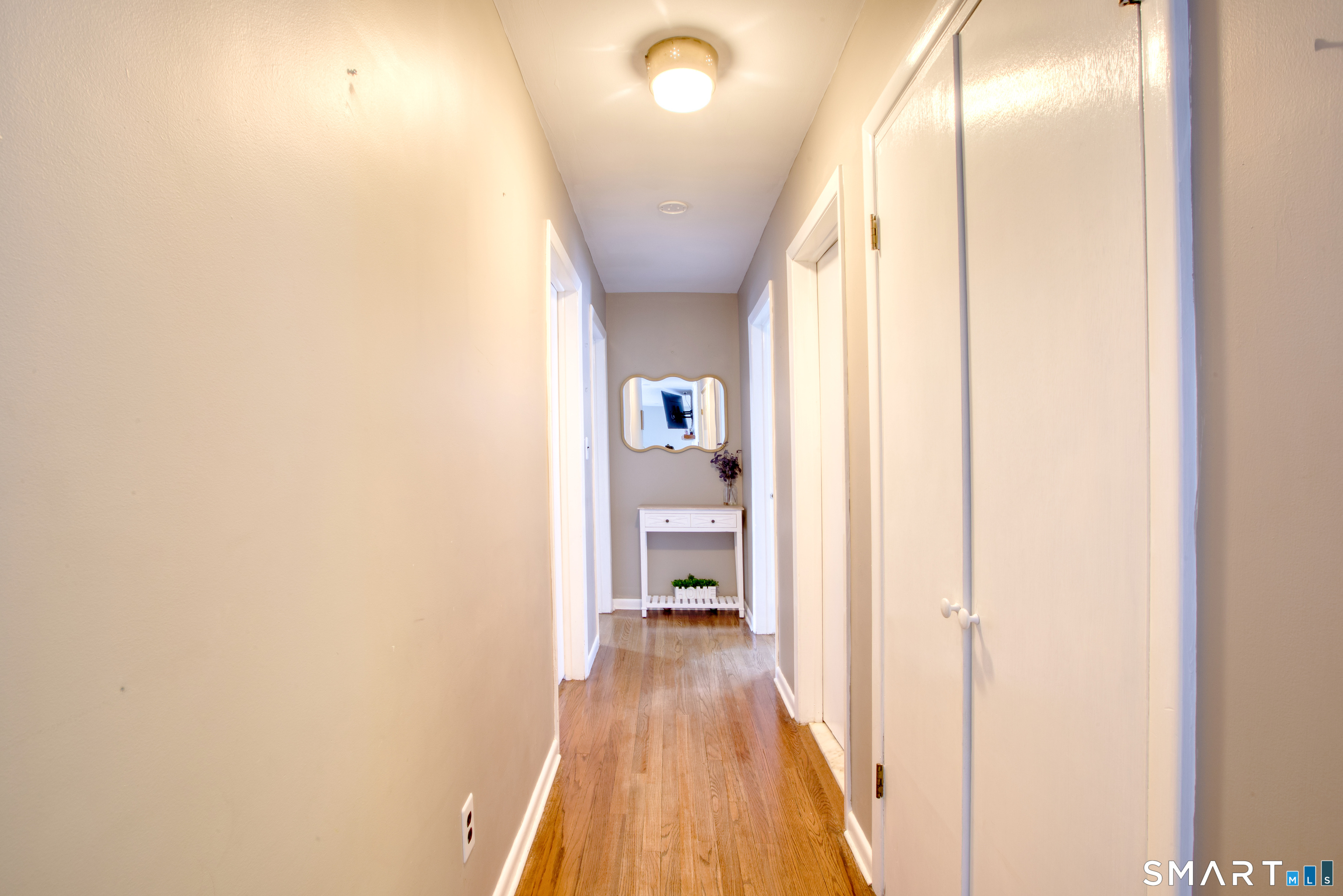 4 Edmond Road Bethel, CT 06801 - Photo 10 of 40 a view of a hallway with wooden floor