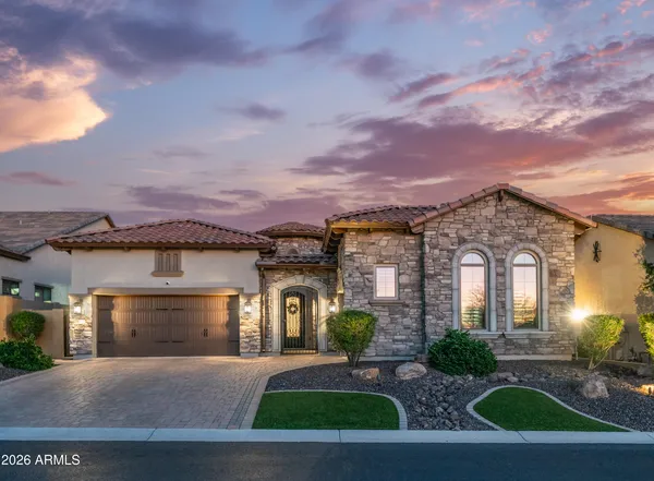 a view of a swimming pool with an outdoor seating