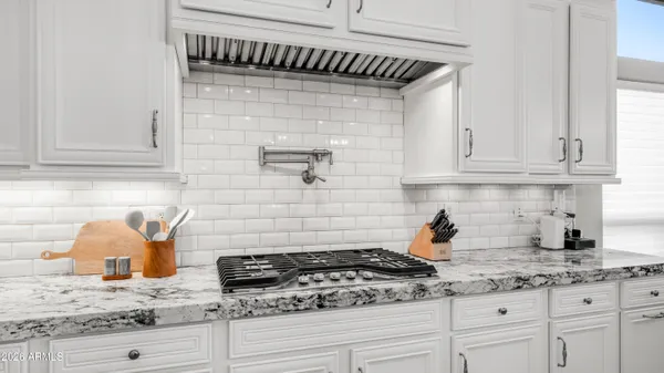 a bedroom with a bed and a toilet