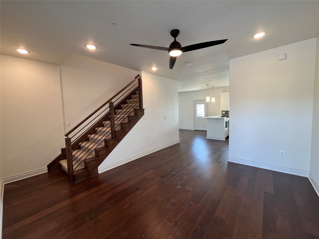 2105 Tiger Trail, Unit 501 Round Rock, TX 78664 - Photo 2 of 10 a view of entryway and hall with wooden floor