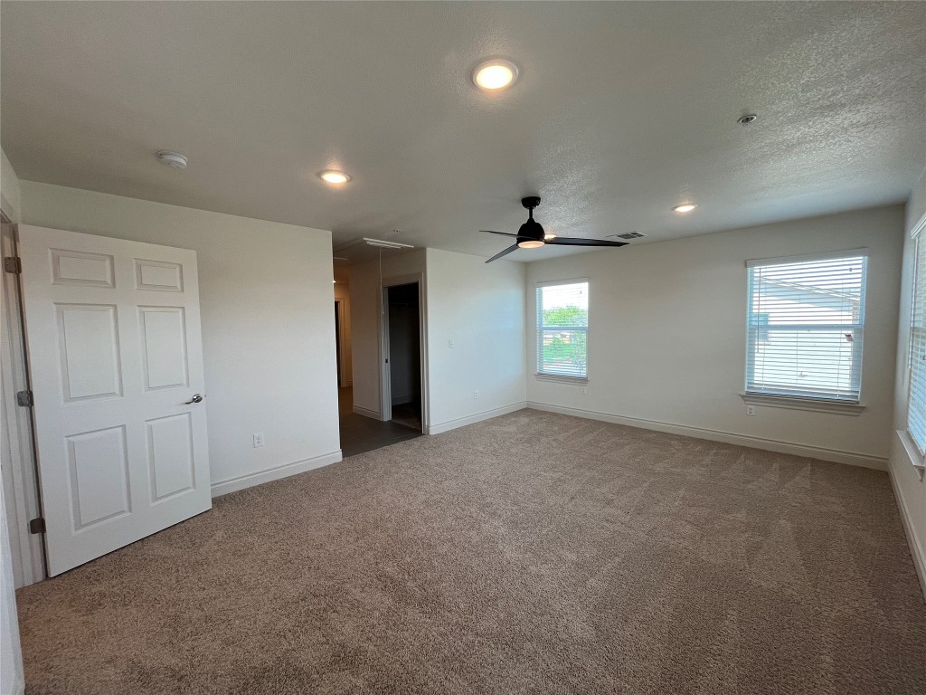 2105 Tiger Trail, Unit 501 Round Rock, TX 78664 - Photo 6 of 10 a view of an empty room and a window