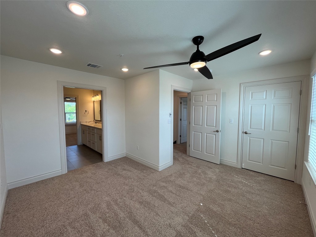 2105 Tiger Trail, Unit 501 Round Rock, TX 78664 - Photo 7 of 10 a view of an empty room and a window