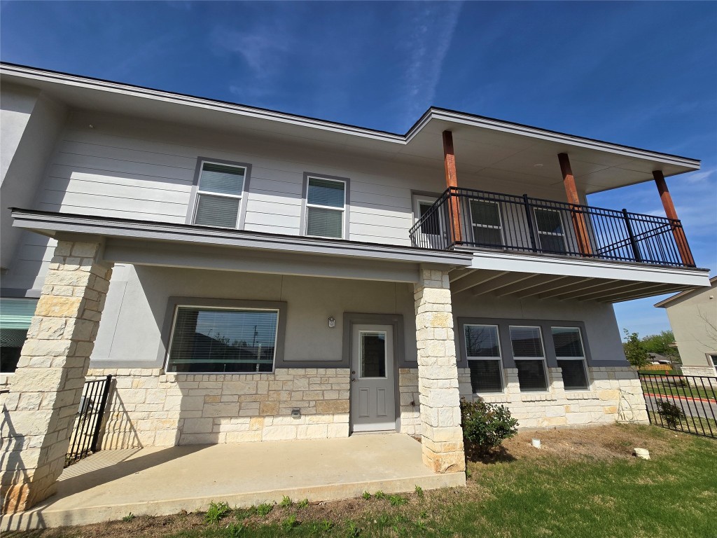 2105 Tiger Trail, Unit 501 Round Rock, TX 78664 - Photo 10 of 10 a view of a building with a door
