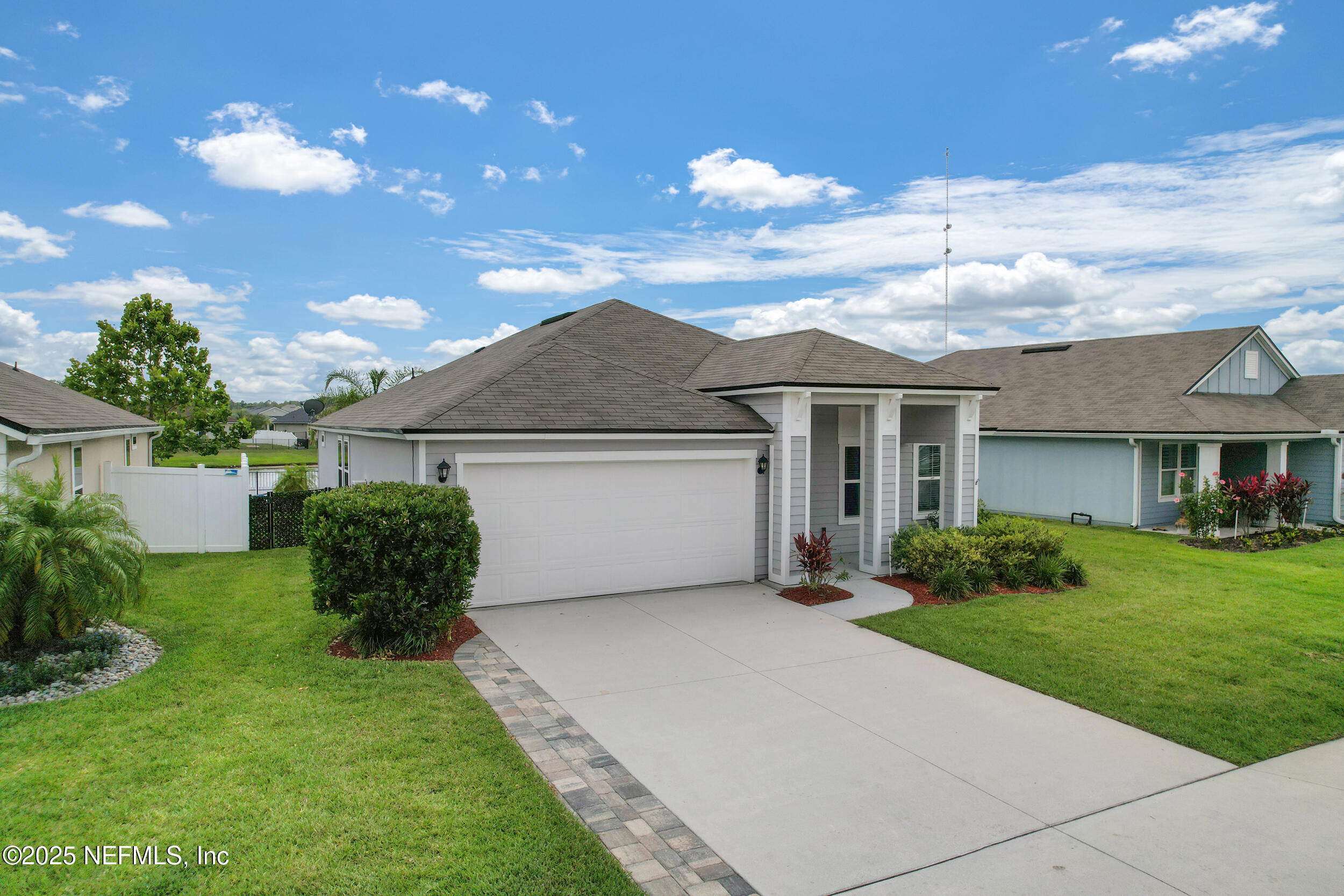 258 Fox Water Trail St. Augustine, FL 32086 - Photo 2 of 50 front view of a house with a yard