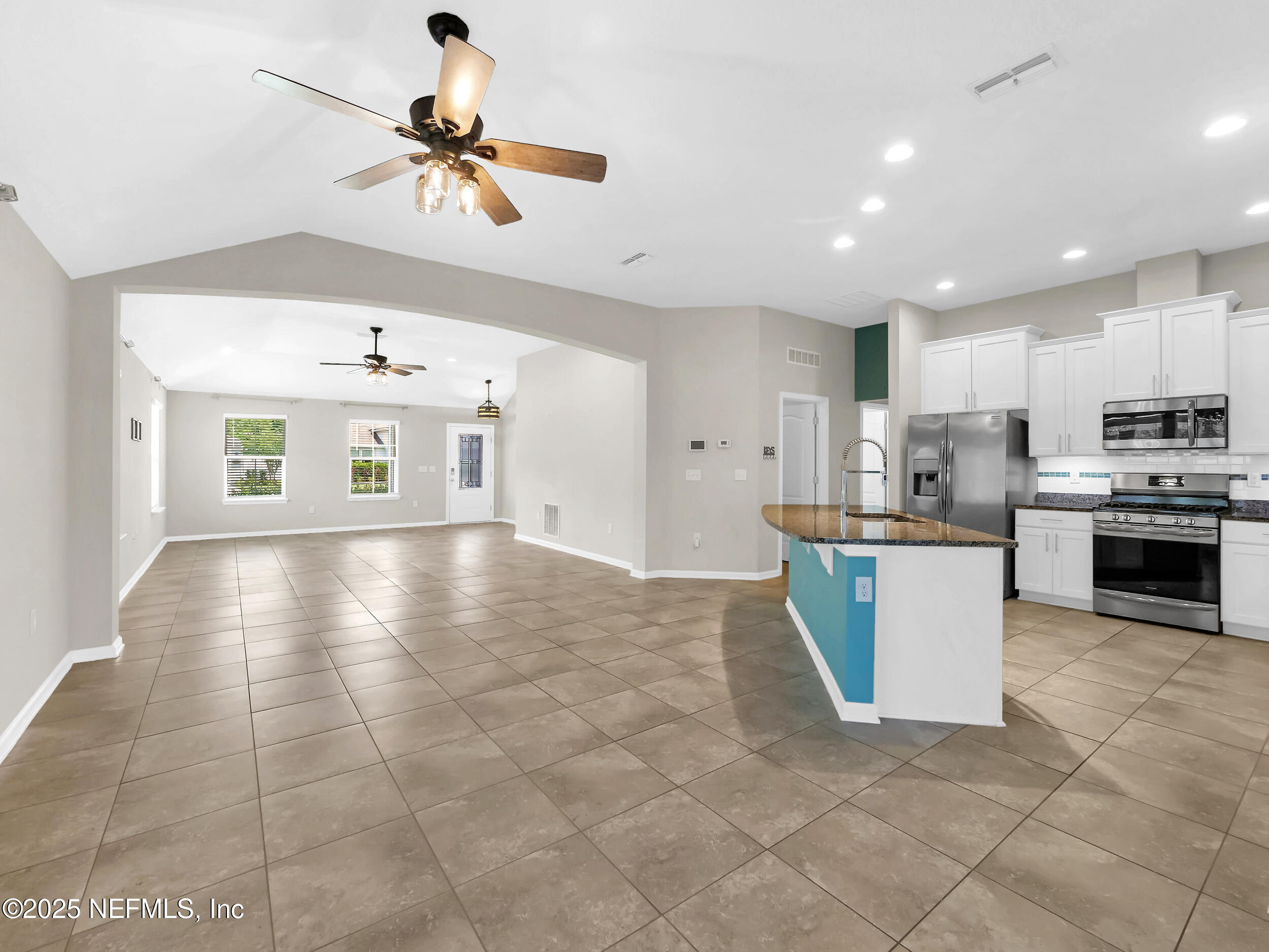 258 Fox Water Trail St. Augustine, FL 32086 - Photo 23 of 50 a large kitchen with cabinets