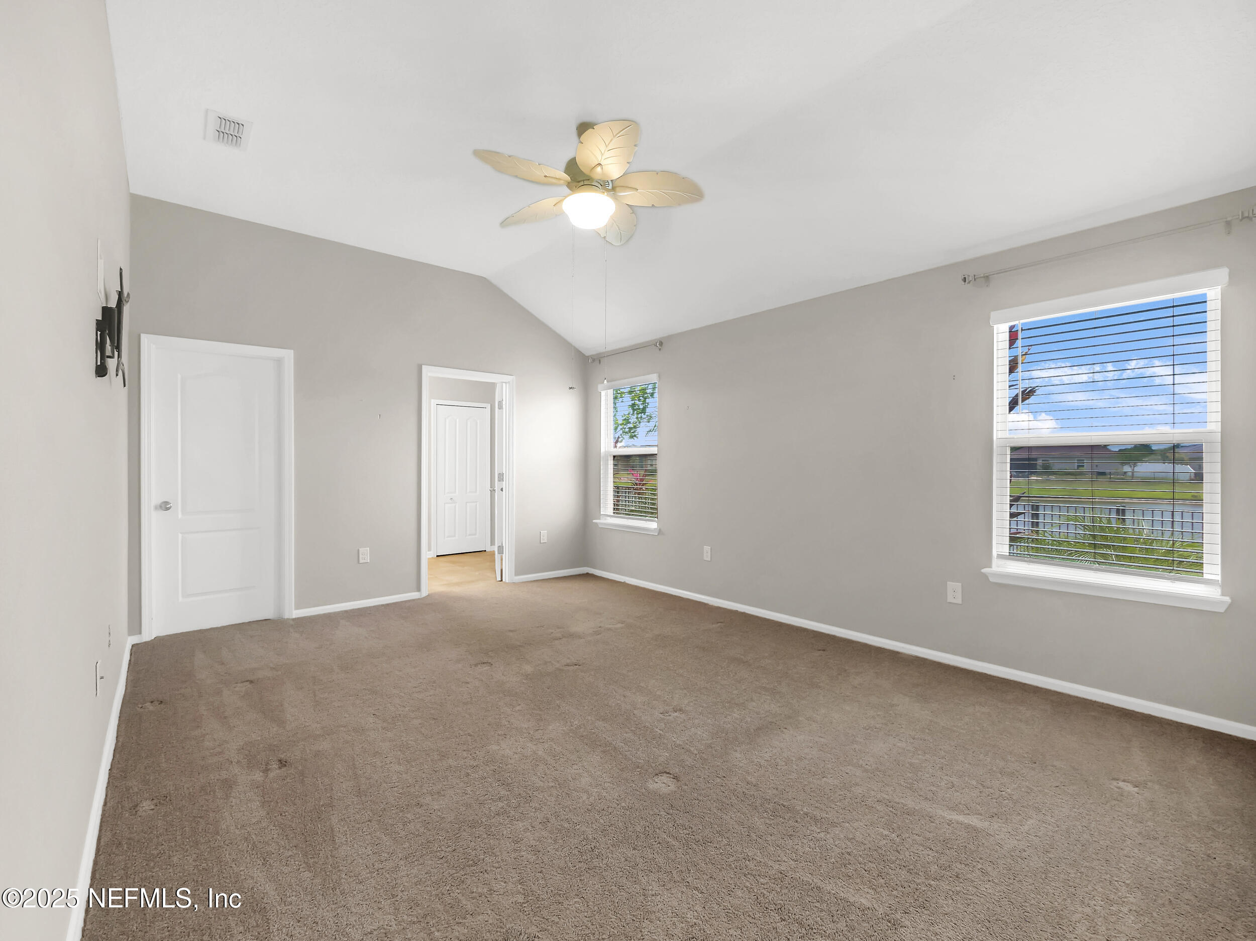 258 Fox Water Trail St. Augustine, FL 32086 - Photo 24 of 50 a view of an empty room with a window