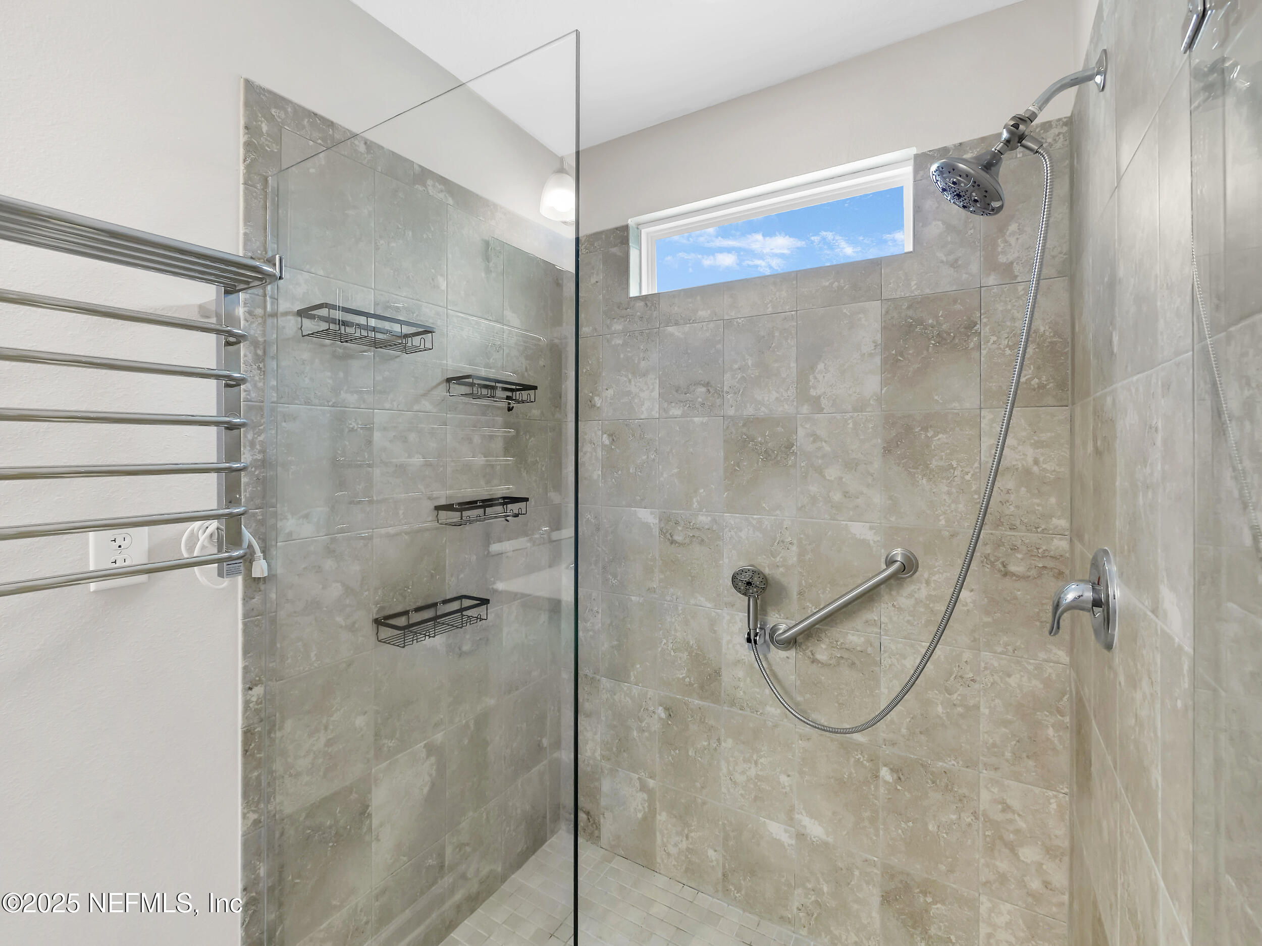 258 Fox Water Trail St. Augustine, FL 32086 - Photo 30 of 50 a bathroom with a glass shower door