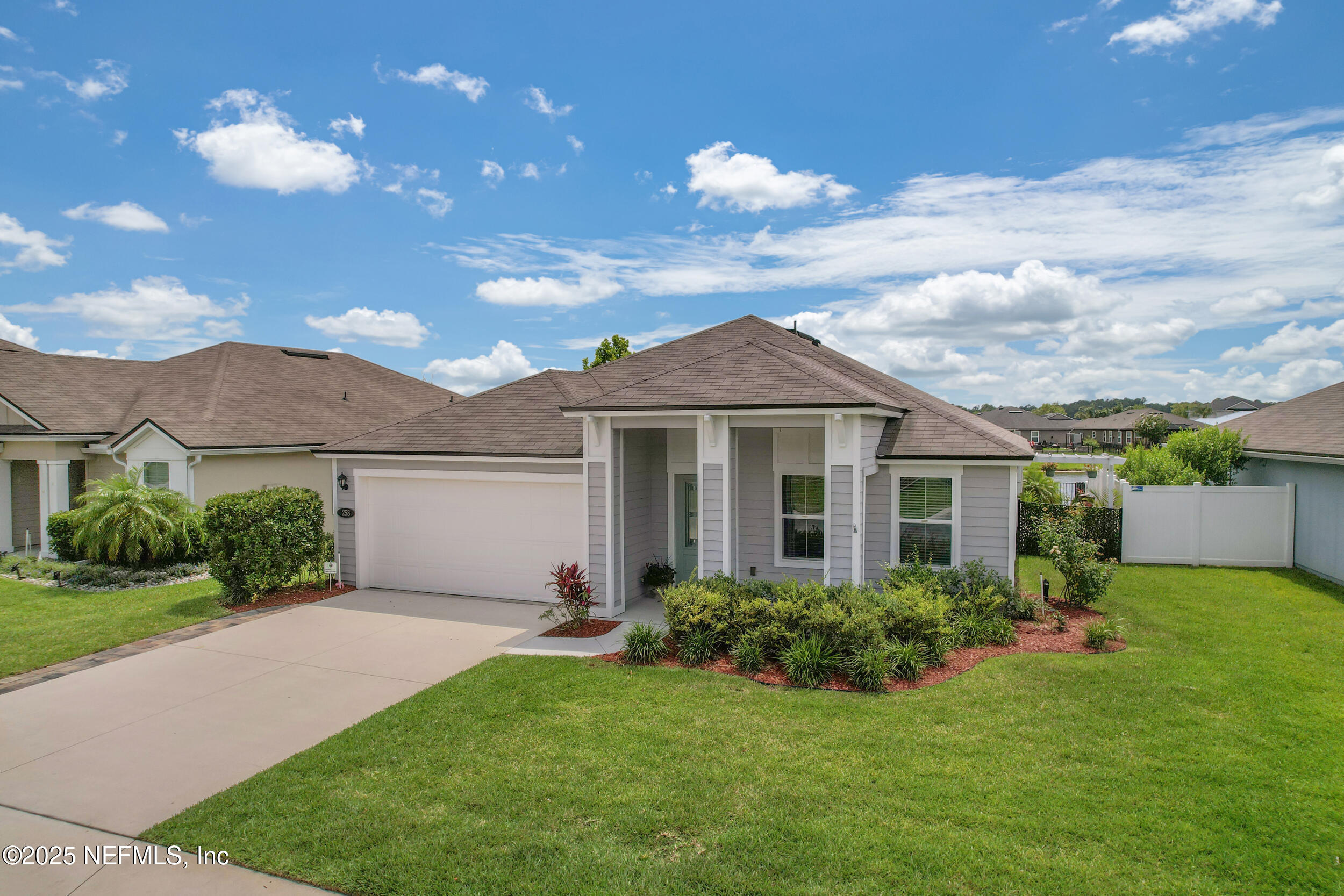 258 Fox Water Trail St. Augustine, FL 32086 - Photo 3 of 50 a view of a front of a house with a yard