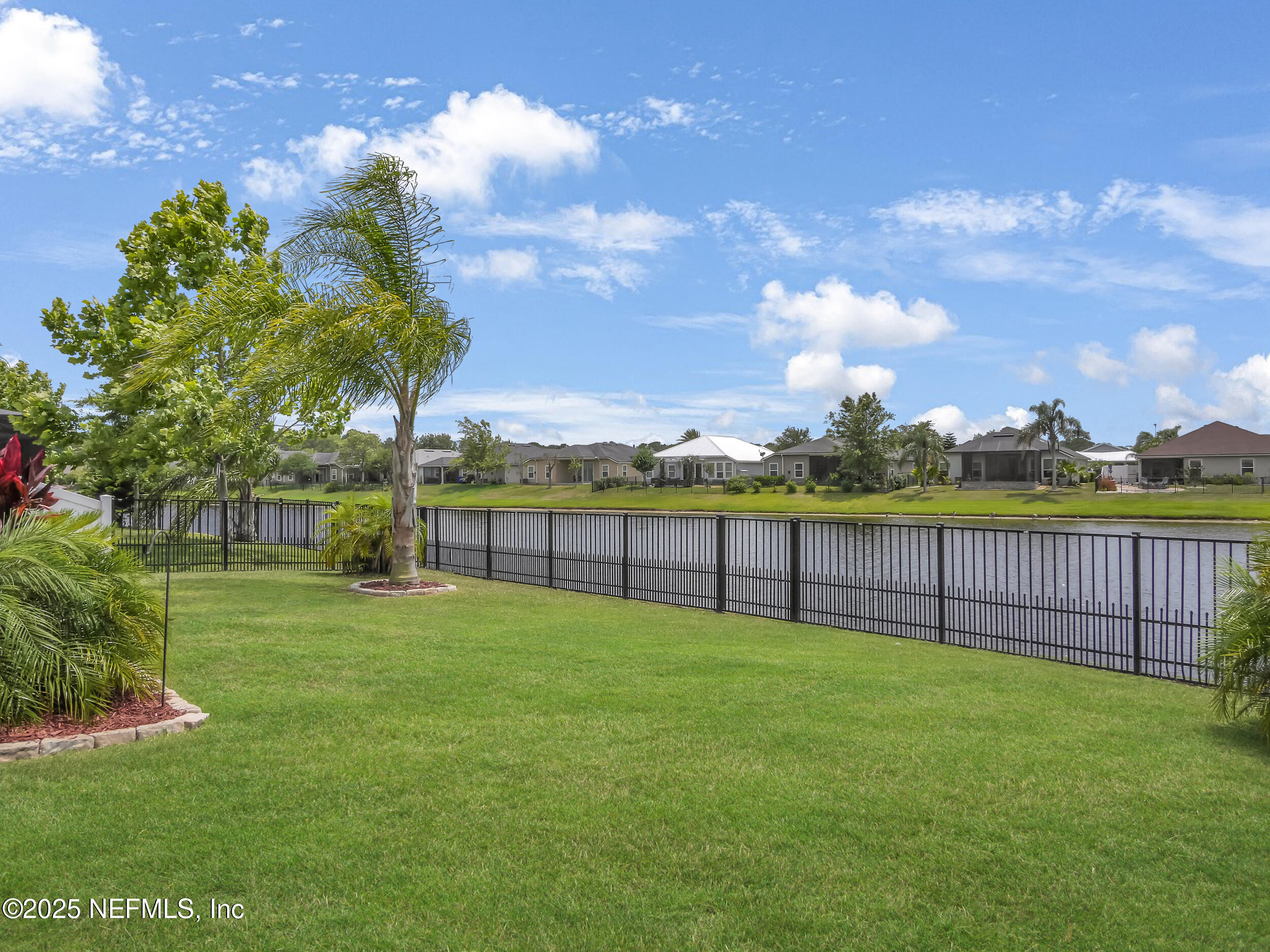 258 Fox Water Trail St. Augustine, FL 32086 - Photo 36 of 50 a view of a yard with a garden