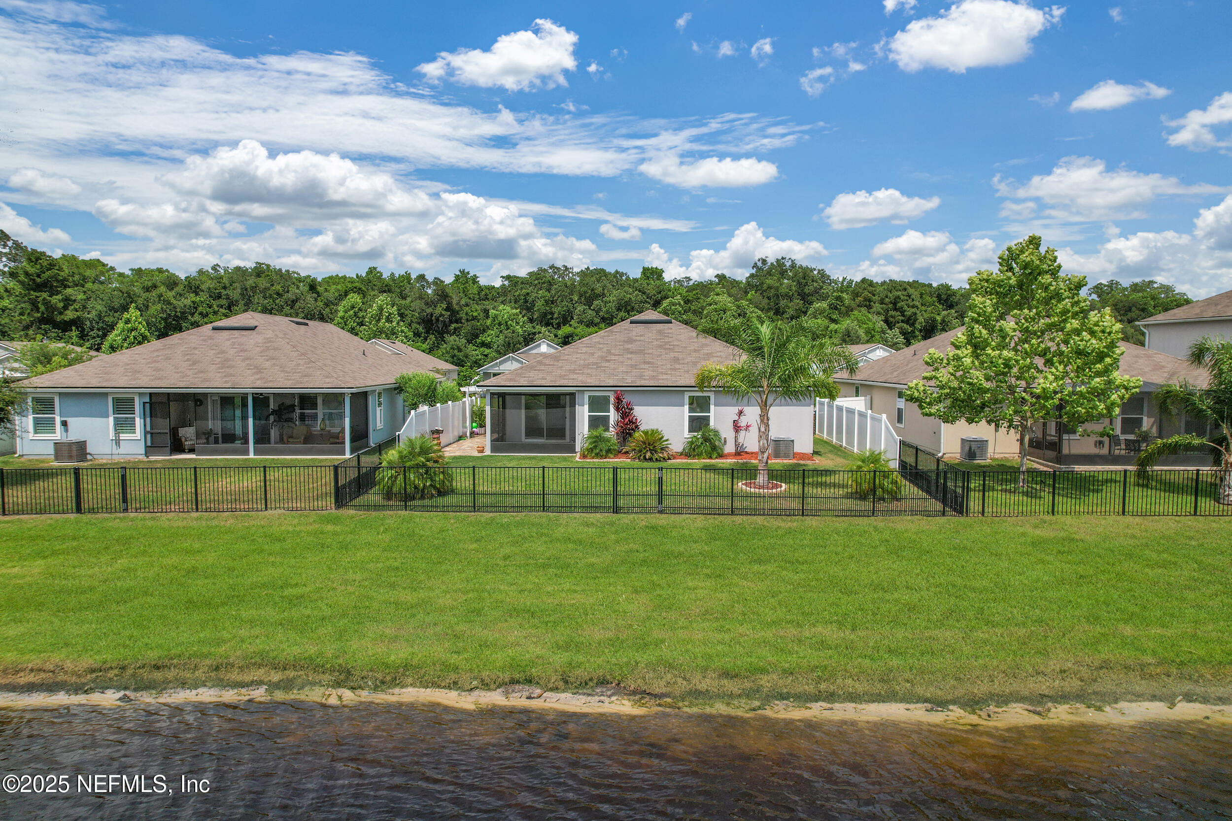 258 Fox Water Trail St. Augustine, FL 32086 - Photo 40 of 50 a view of a house with a big yard