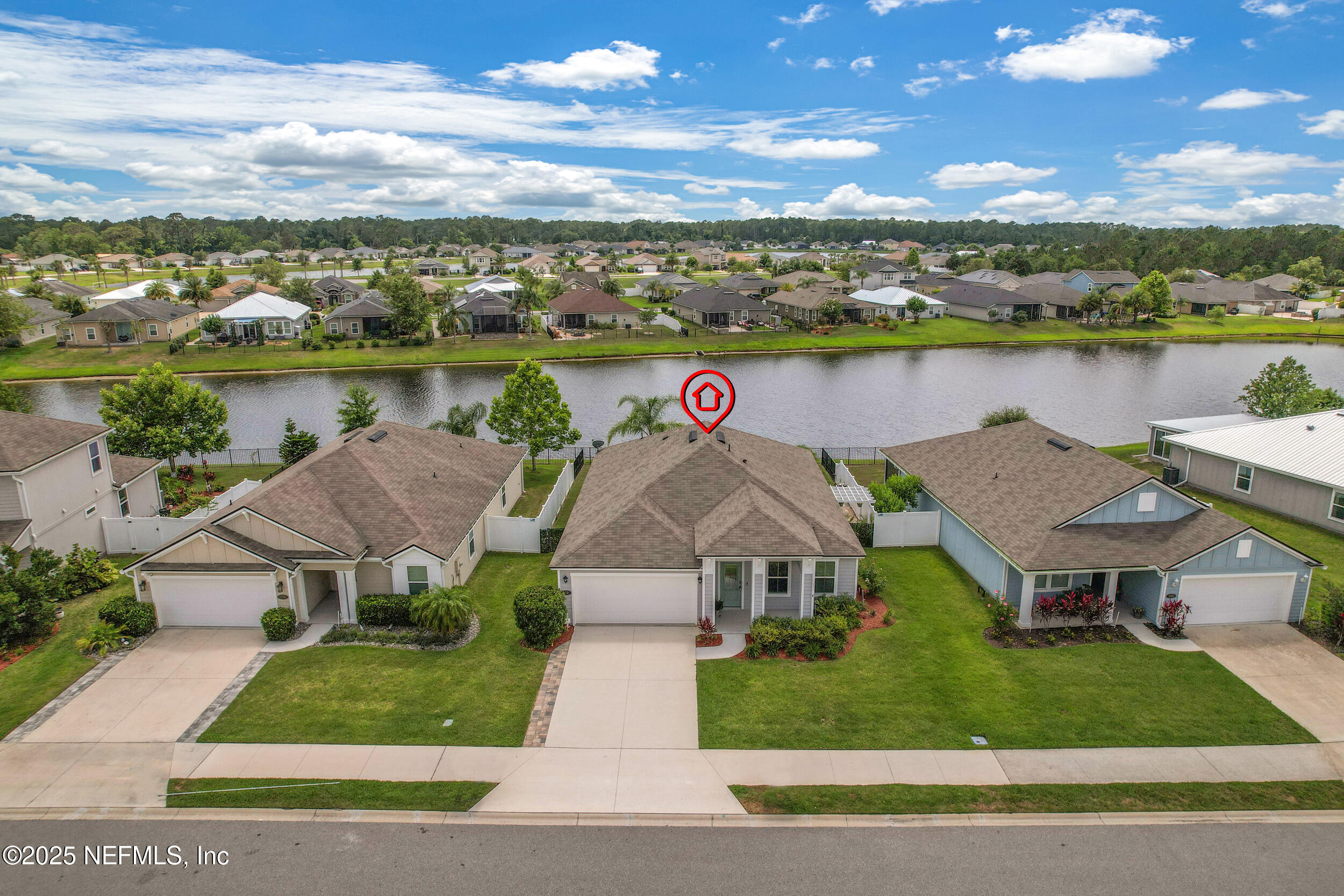 258 Fox Water Trail St. Augustine, FL 32086 - Photo 43 of 50 an aerial view of a house with a yard and lake view