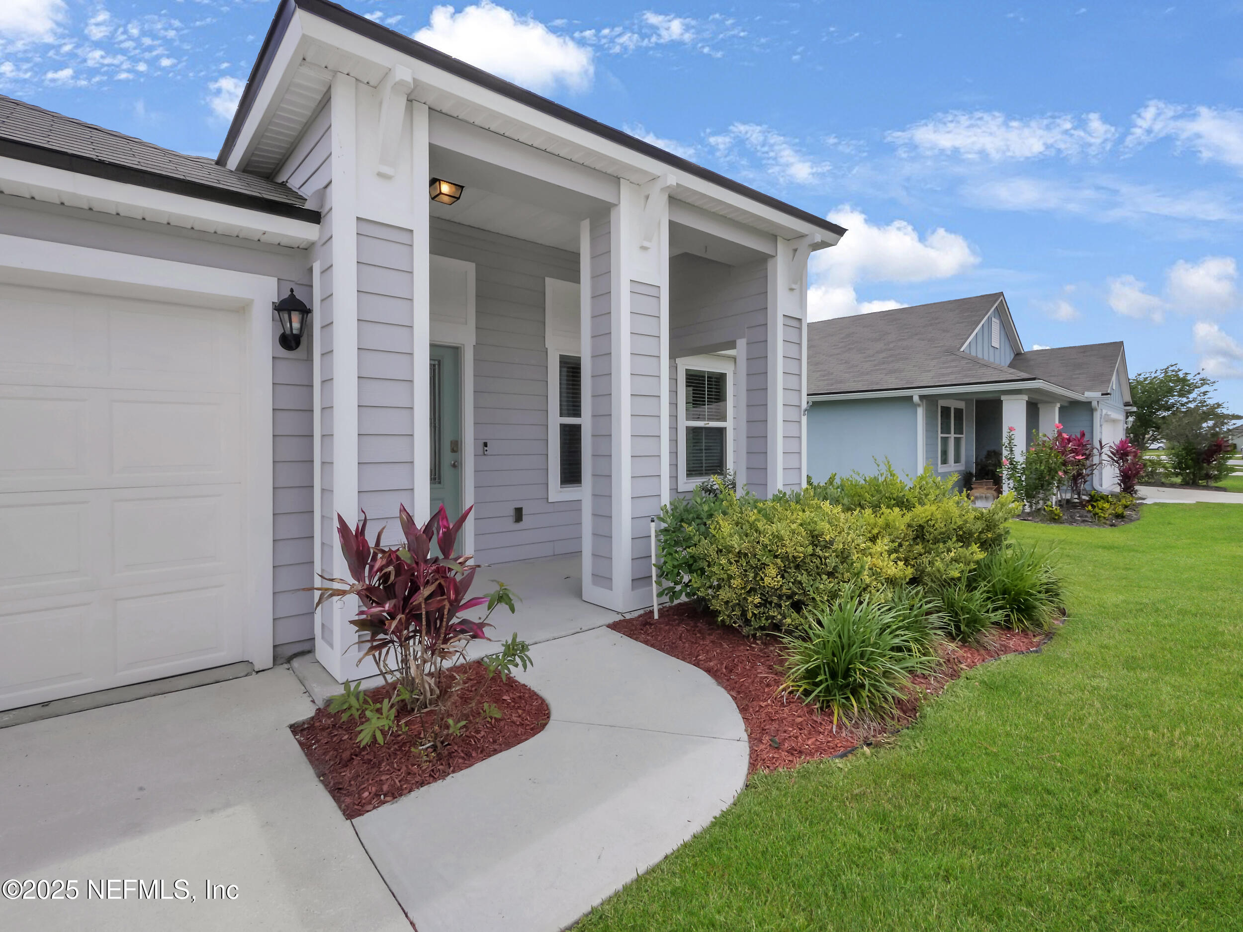 258 Fox Water Trail St. Augustine, FL 32086 - Photo 5 of 50 a view of a house with a garden