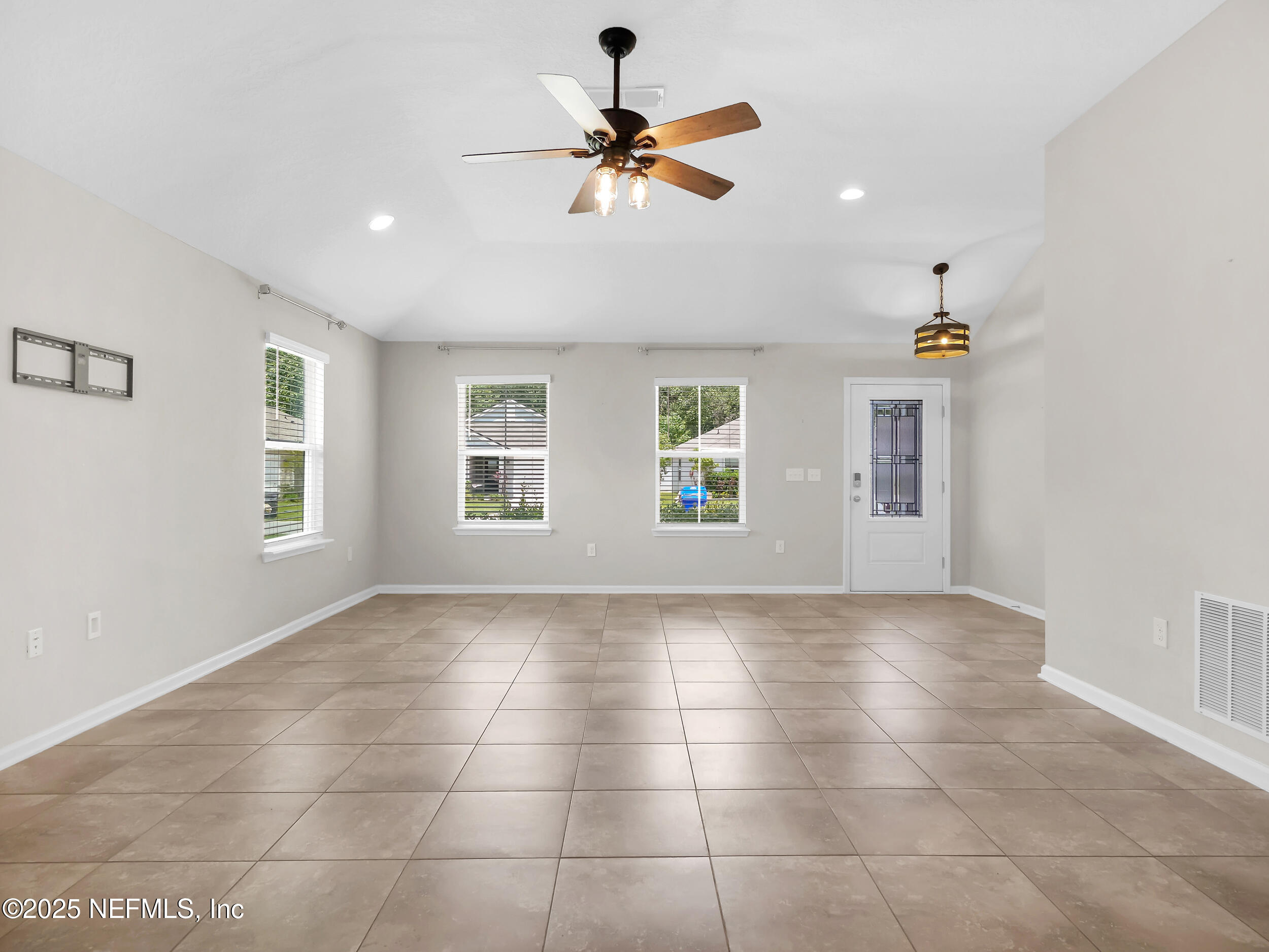 258 Fox Water Trail St. Augustine, FL 32086 - Photo 10 of 50 a view of an empty room with a window