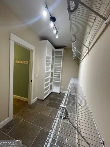 a view of a livingroom with a staircase