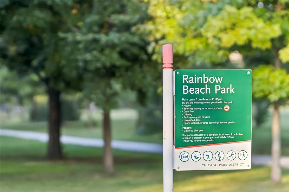 3017 East 78th Street, Unit 4B Chicago, IL 60649 - Photo 3 of 15 a sign that is on a brick wall