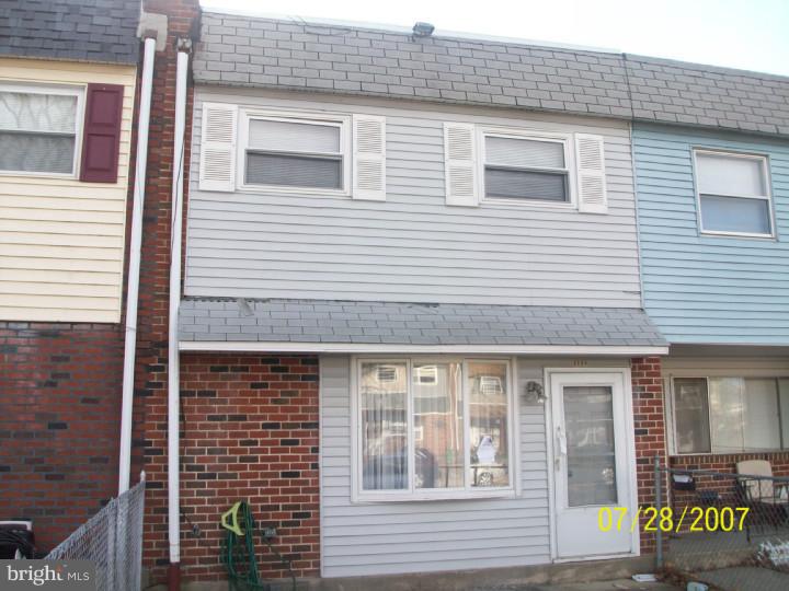 3204 Fairdale Road Philadelphia, PA 19154 - Photo 1 of 1 a view of a building with a door and windows