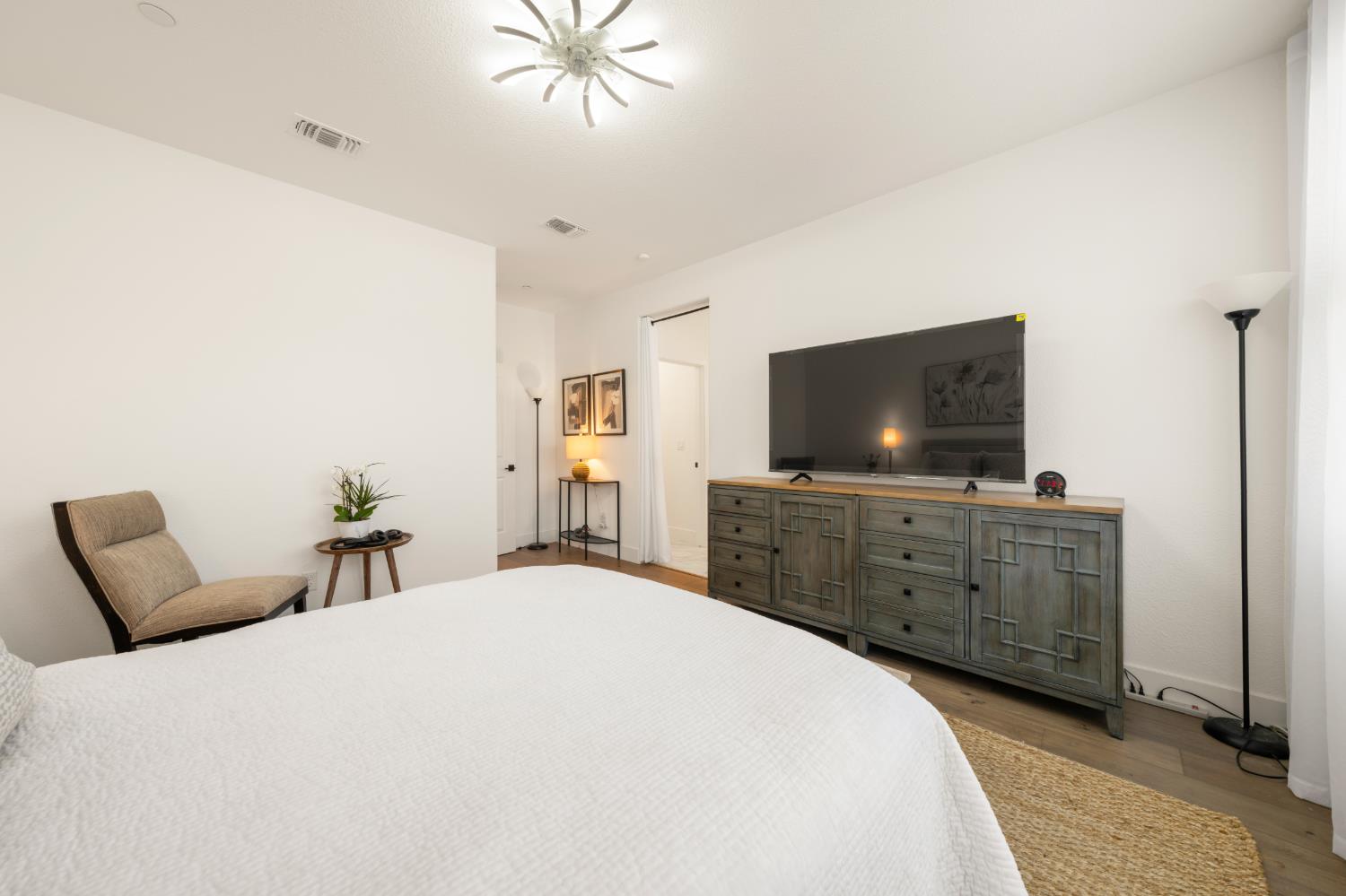 4216 Creede Way Rancho Cordova, CA 95742 - Photo 24 of 56 a bedroom with a bed and a flat screen tv