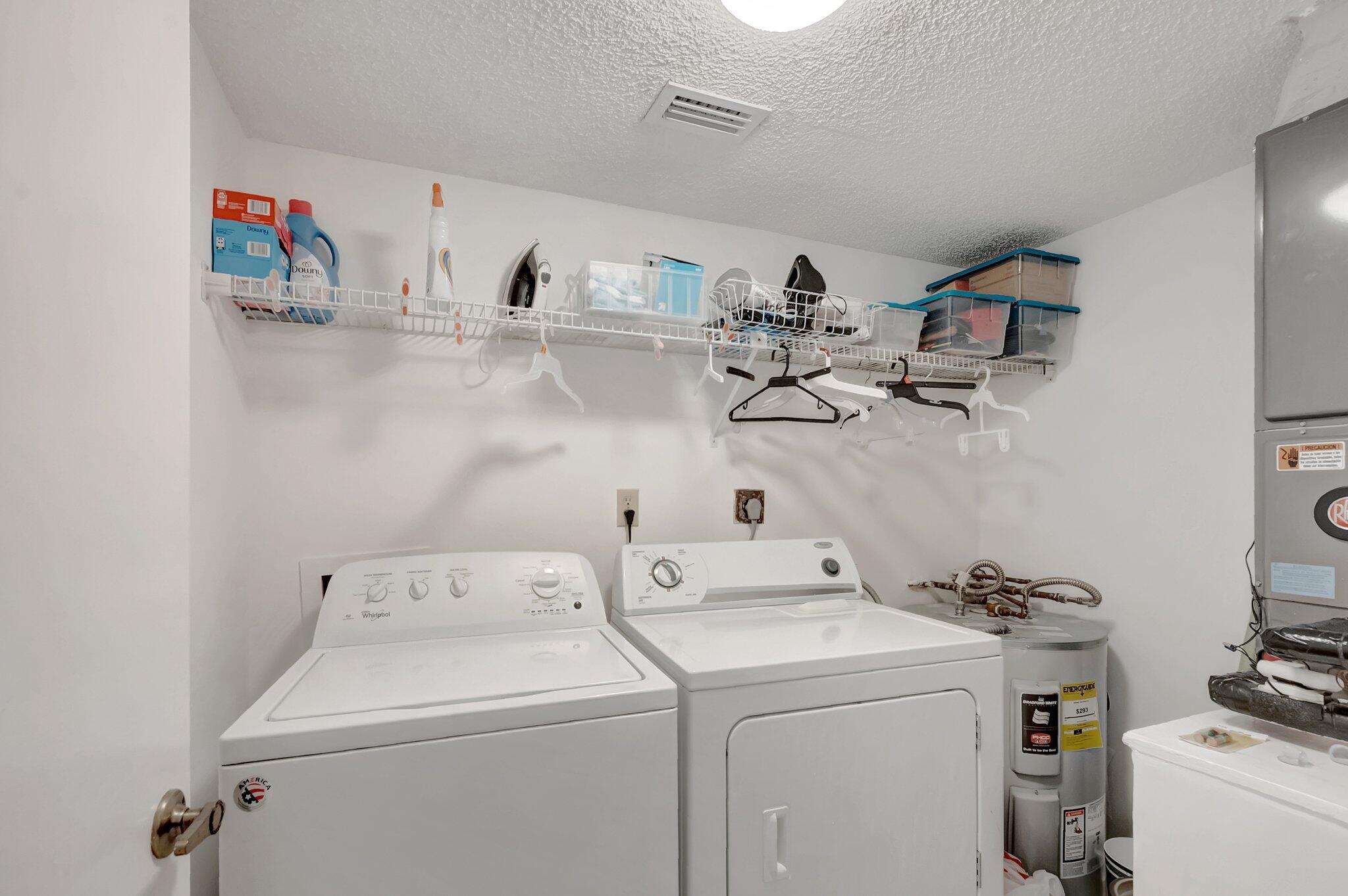 7950 La Mirada Drive Boca Raton, FL 33433 - Photo 31 of 42 a utility room with dryer and washer