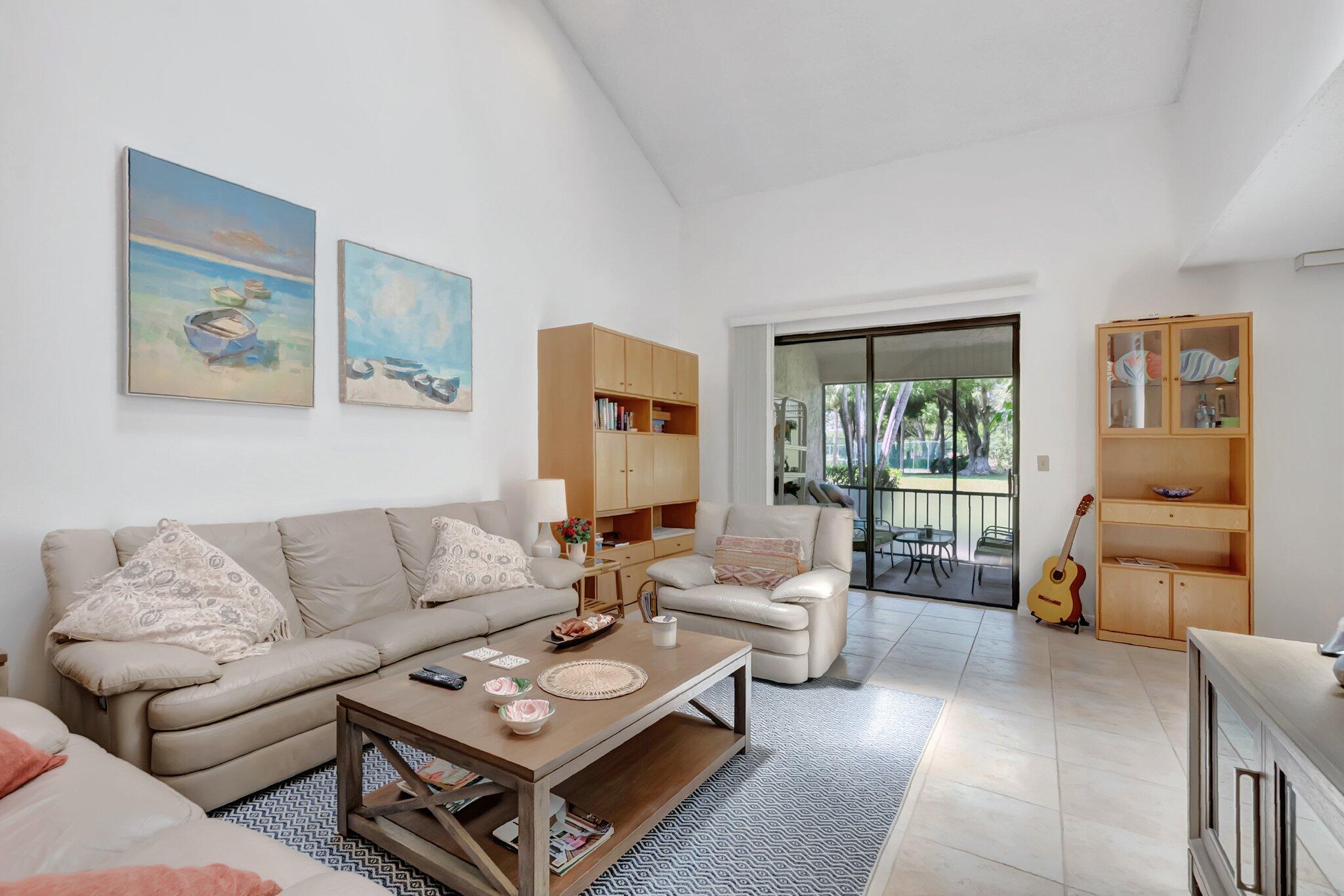 7950 La Mirada Drive Boca Raton, FL 33433 - Photo 5 of 42 a living room with furniture and a couch