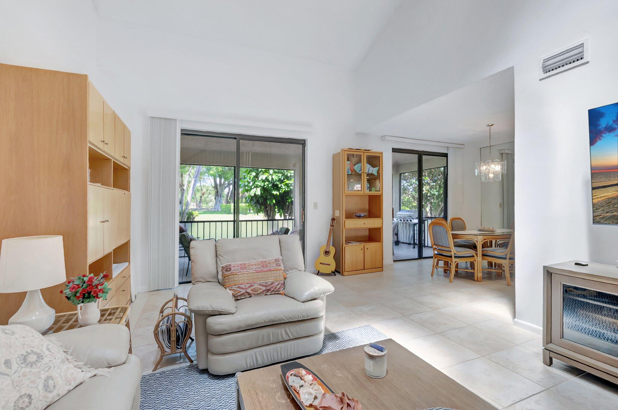 7950 La Mirada Drive Boca Raton, FL 33433 - Photo 6 of 42 a living room with furniture and a large window