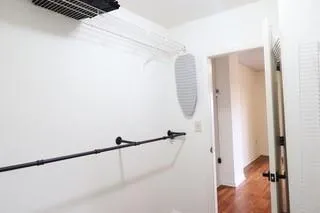 a bathroom with a shower and a sink