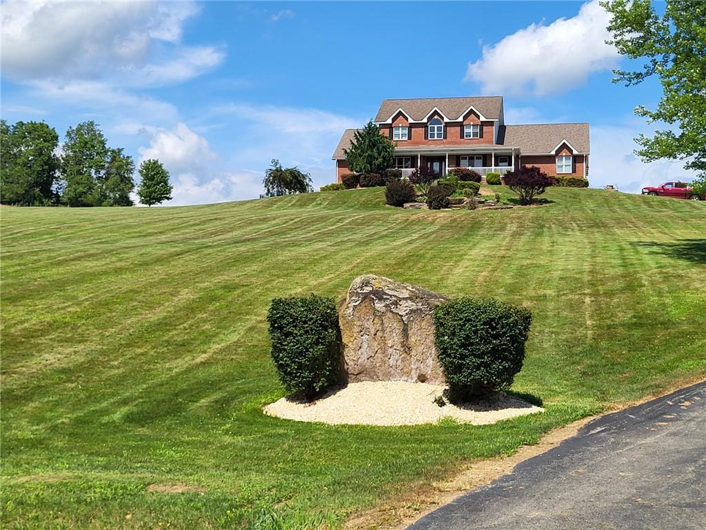 56 Lanik Road Bentleyville, PA 15314 - Photo 3 of 50 a view of a pool with a yard