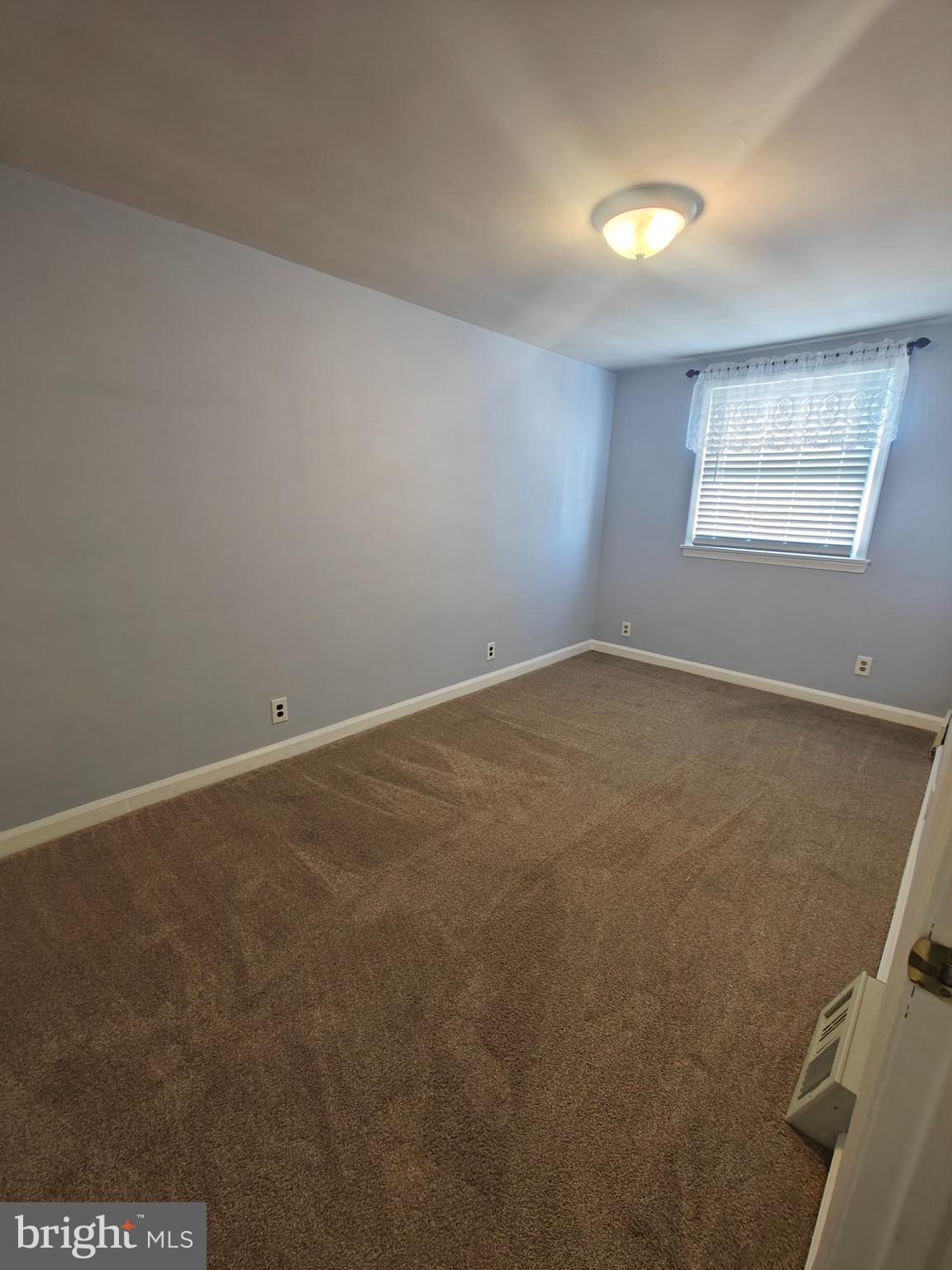 6448 Akron Street Philadelphia, PA 19149 - Photo 27 of 30 an empty room with windows