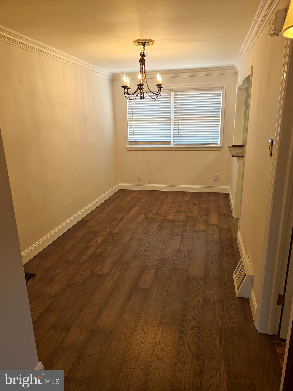 6448 Akron Street Philadelphia, PA 19149 - Photo 9 of 30 a view of an empty room with a window