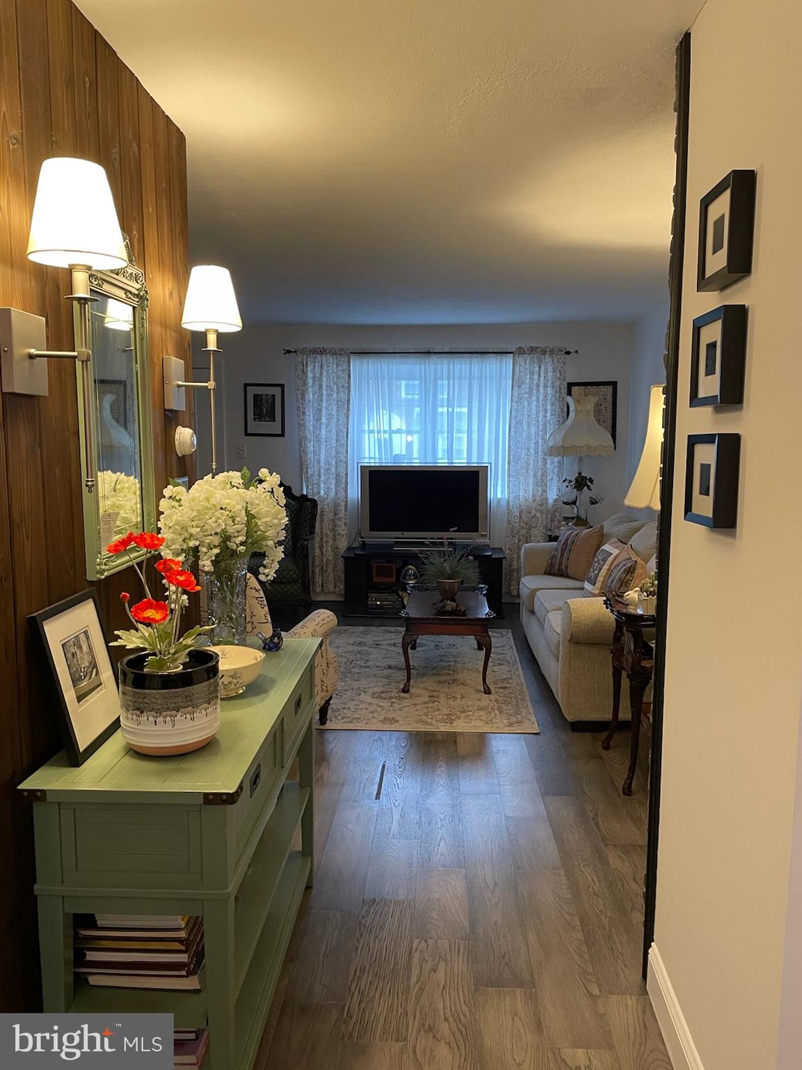 6448 Akron Street Philadelphia, PA 19149 - Photo 10 of 30 a living room with furniture and a flat screen tv