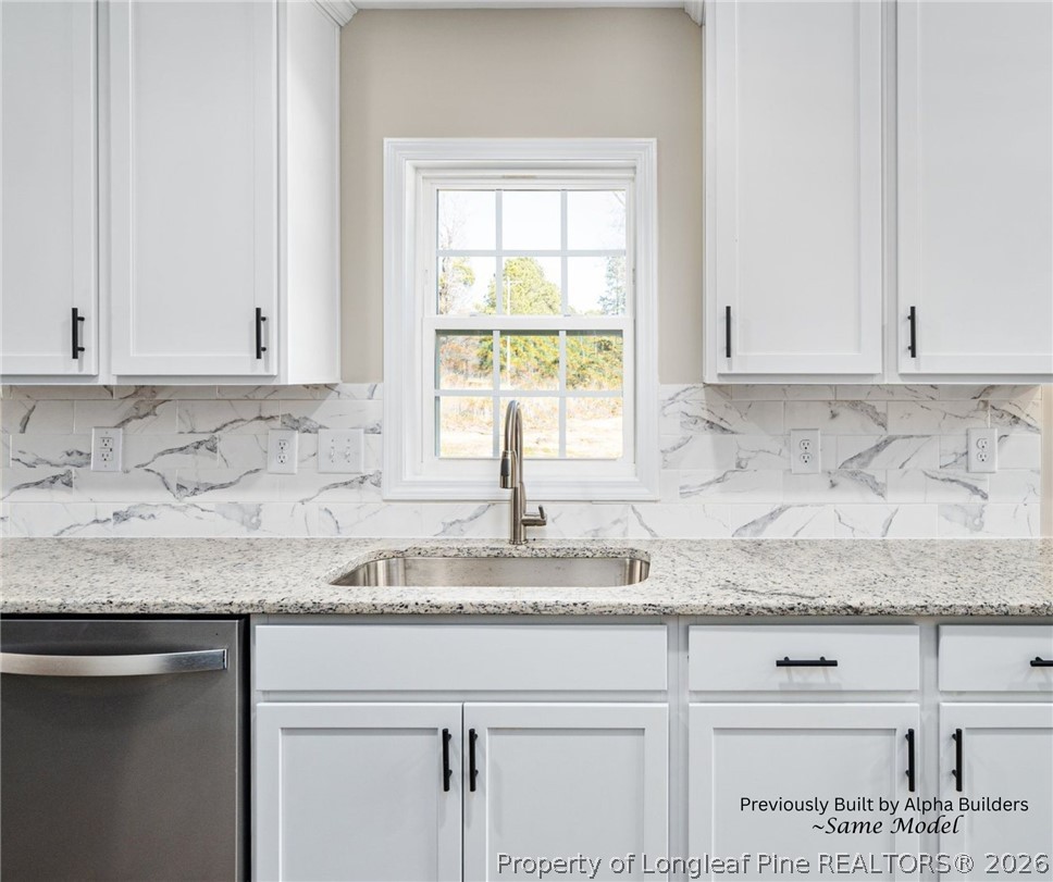 973 Martin Road St. Pauls, NC 28384 - Photo 3 of 19 Stylish kitchen design with upgraded finishes and abundant natural light.