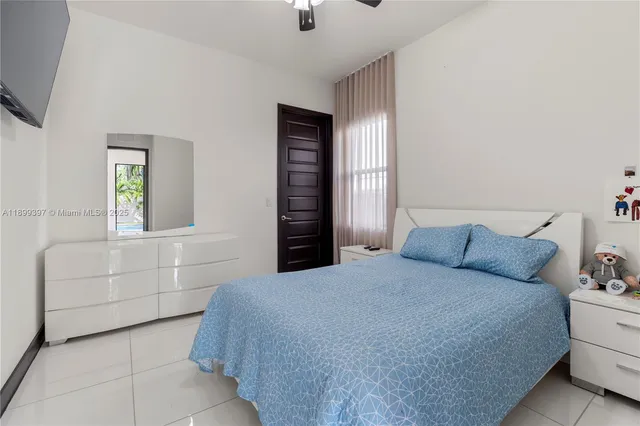 a bathroom with a shower and toilet