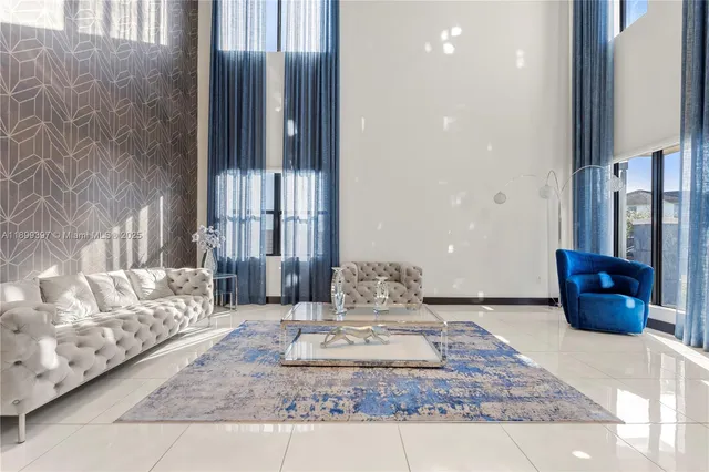 a view of a bedroom with furniture