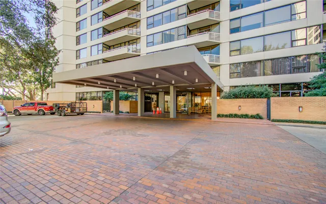 a view of a building with a street