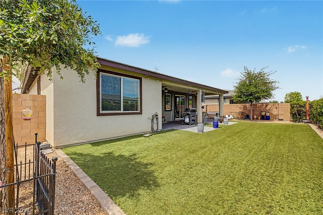 4914 East Beacon Ridge Drive Pahrump, NV 89061 - Photo 27 of 34 A private, low-maintenance yard offers an ideal setting for relaxation and outdoor entertaining.
