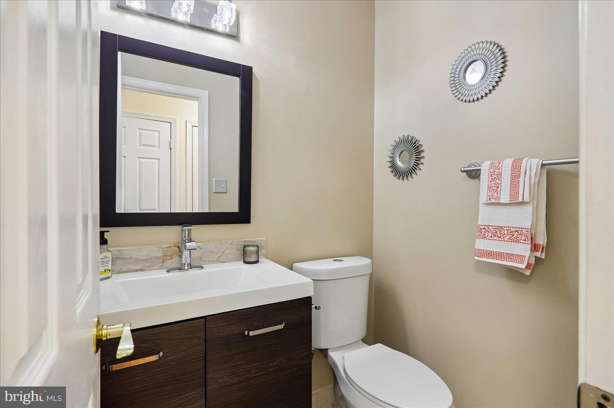 7408 Spring Tree Drive Springfield, VA 22153 - Photo 13 of 48 Chic and modern half-bath retreat.