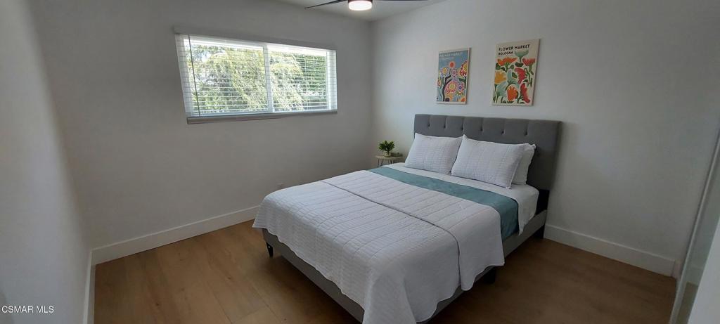 4071 Peoria Avenue Simi Valley, CA 93063 - Photo 14 of 19 a bedroom with a bed and a window