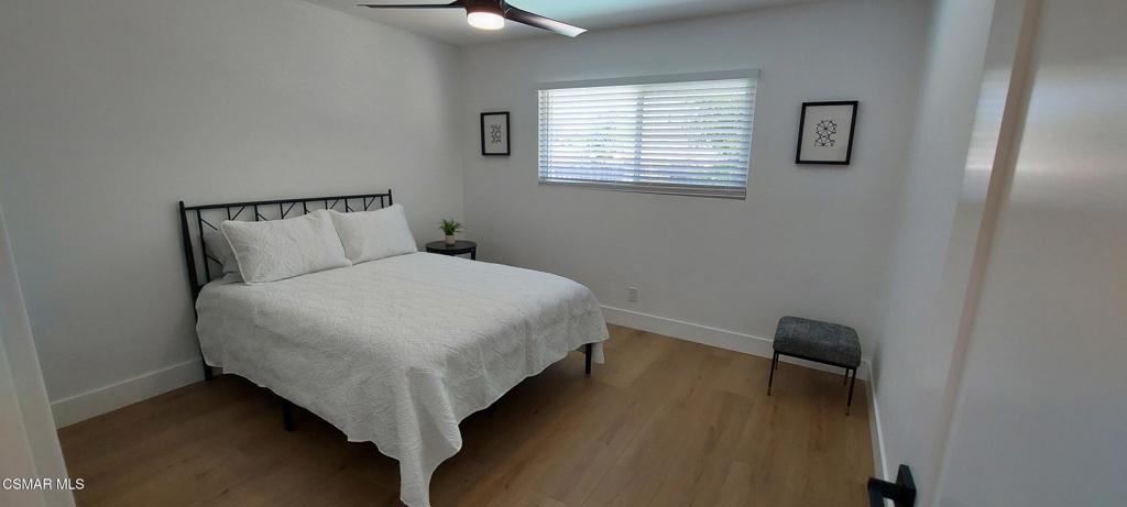 4071 Peoria Avenue Simi Valley, CA 93063 - Photo 16 of 19 a bedroom with a bed and a window