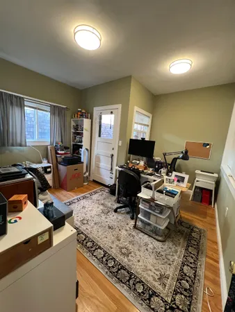 a living room with furniture or couch and a window
