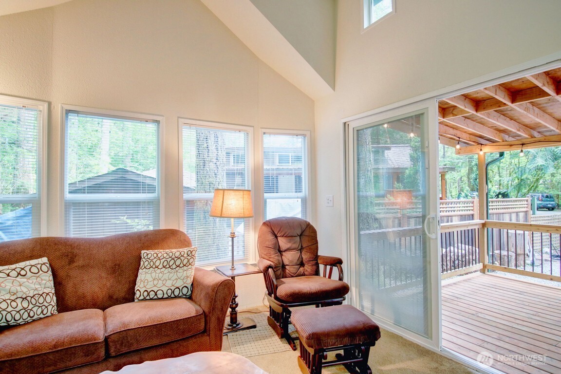 20 Goldrush Road Deming, WA 98244 - Photo 11 of 40 a living room with furniture and a large window