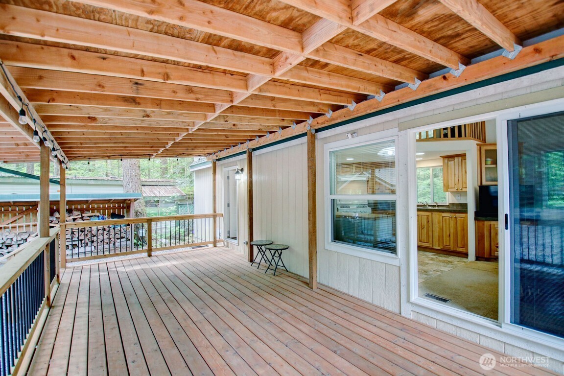 20 Goldrush Road Deming, WA 98244 - Photo 20 of 40 a view of a porch with wooden floor