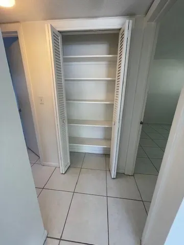 a storage room with washing machine