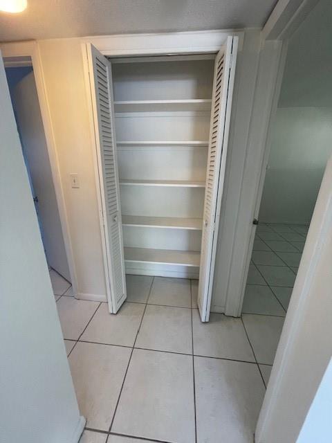808 Southeast 13th Street, Unit 2 Fort Lauderdale, FL 33316 - Photo 12 of 22 a storage room with washing machine