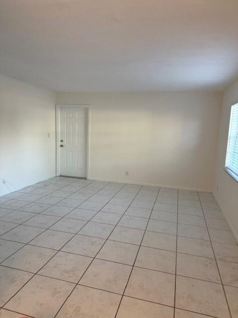 808 Southeast 13th Street, Unit 2 Fort Lauderdale, FL 33316 - Photo 6 of 22 a view of an empty room and window