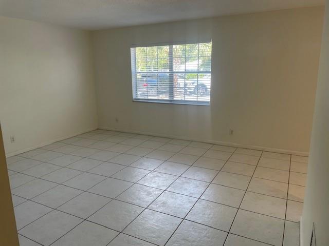 808 Southeast 13th Street, Unit 2 Fort Lauderdale, FL 33316 - Photo 9 of 22 a view of an empty room and a window