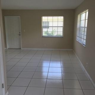 808 Southeast 13th Street, Unit 2 Fort Lauderdale, FL 33316 - Photo 10 of 22 an empty room with windows
