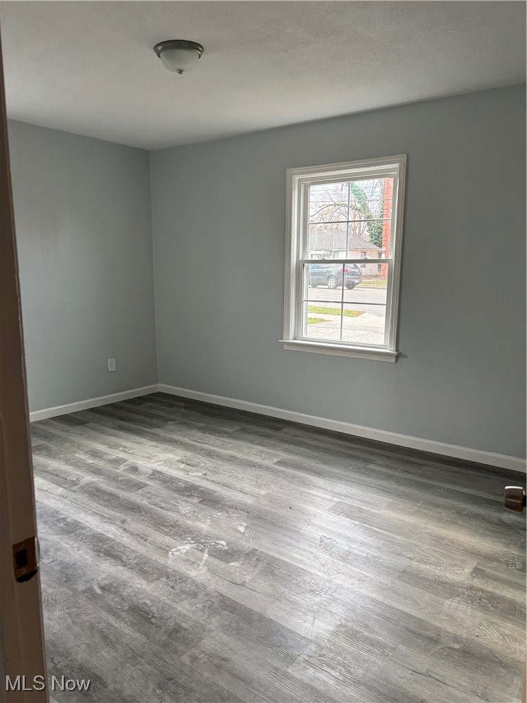 2525 Noble Road, Unit C3 Cleveland Heights, OH 44121 - Photo 7 of 11 Spare room featuring light wood-type flooring