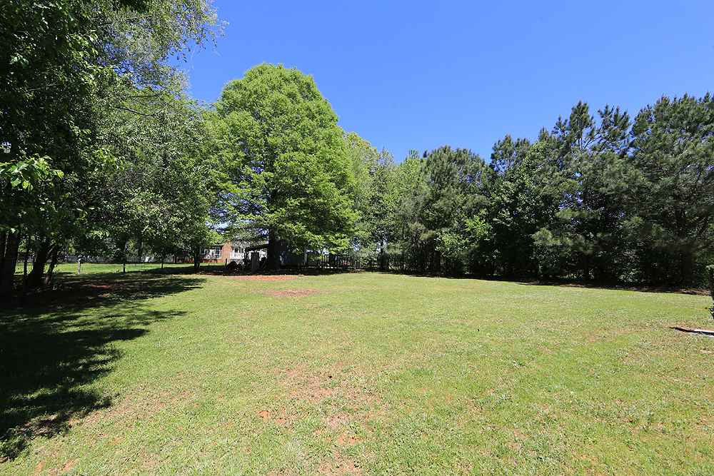 3312 High Gate Road Raleigh, NC 27603 - Photo 20 of 22 Great level back yard - for kids- pets - or gardening. Or just for relaxing.