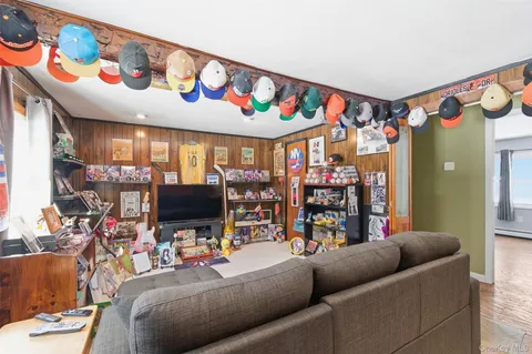 a bedroom with a bed a table and chair