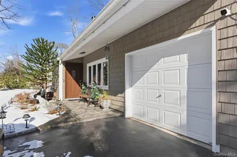 a view of backyard with seating space