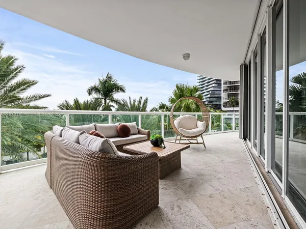 a view of a patio in the backyard